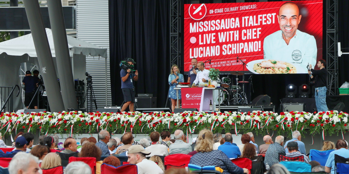 A group of people on stage at Italfest